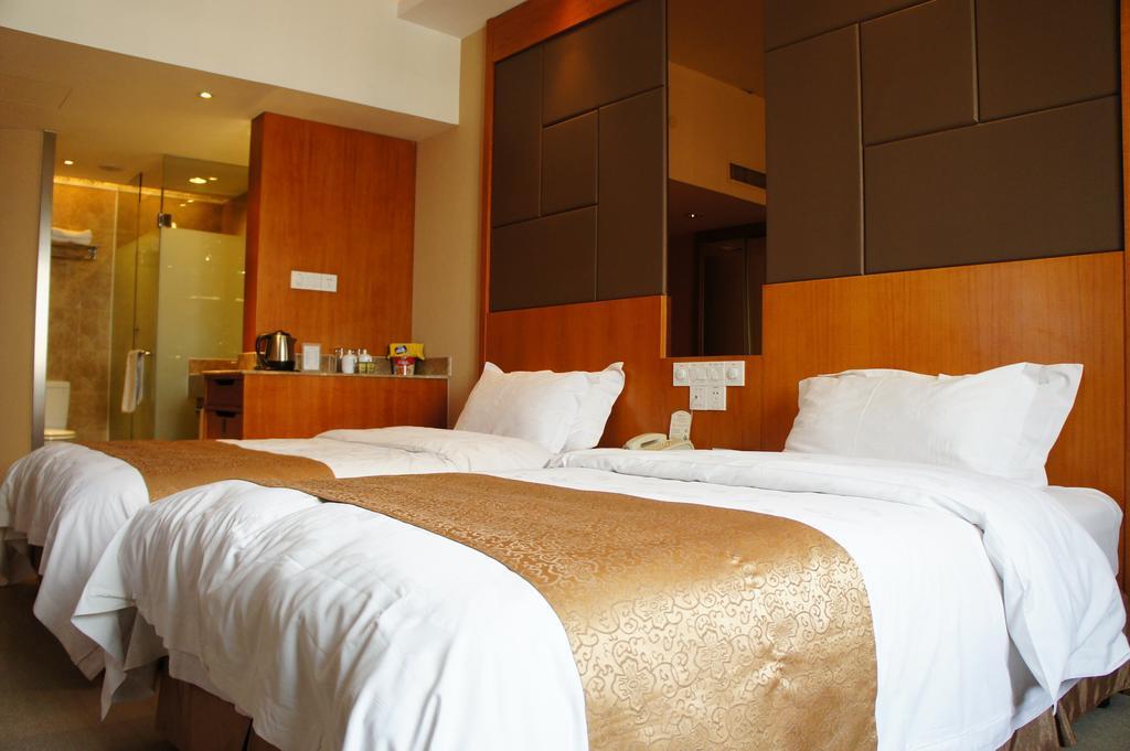 דזיאסין Oriental Hotel Tong Xiang חדר תמונה